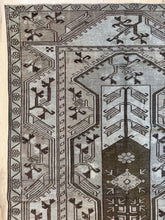 Load image into Gallery viewer, Vintage Anatolian Milas rug 4’2” x 6’11” — close-up of central medallion and angular motifs